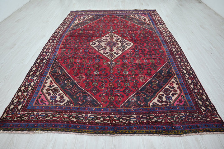 red Large rug 6' 7" x 10' 2"