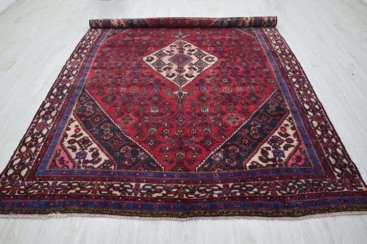 red Large rug 6' 7" x 10' 2"