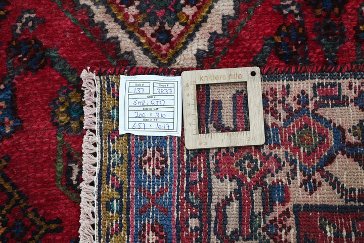 red Large rug 6' 7" x 10' 2"