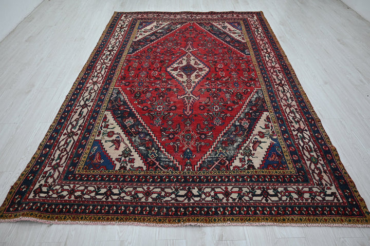 red Large rug 6' 7" x 9' 11"