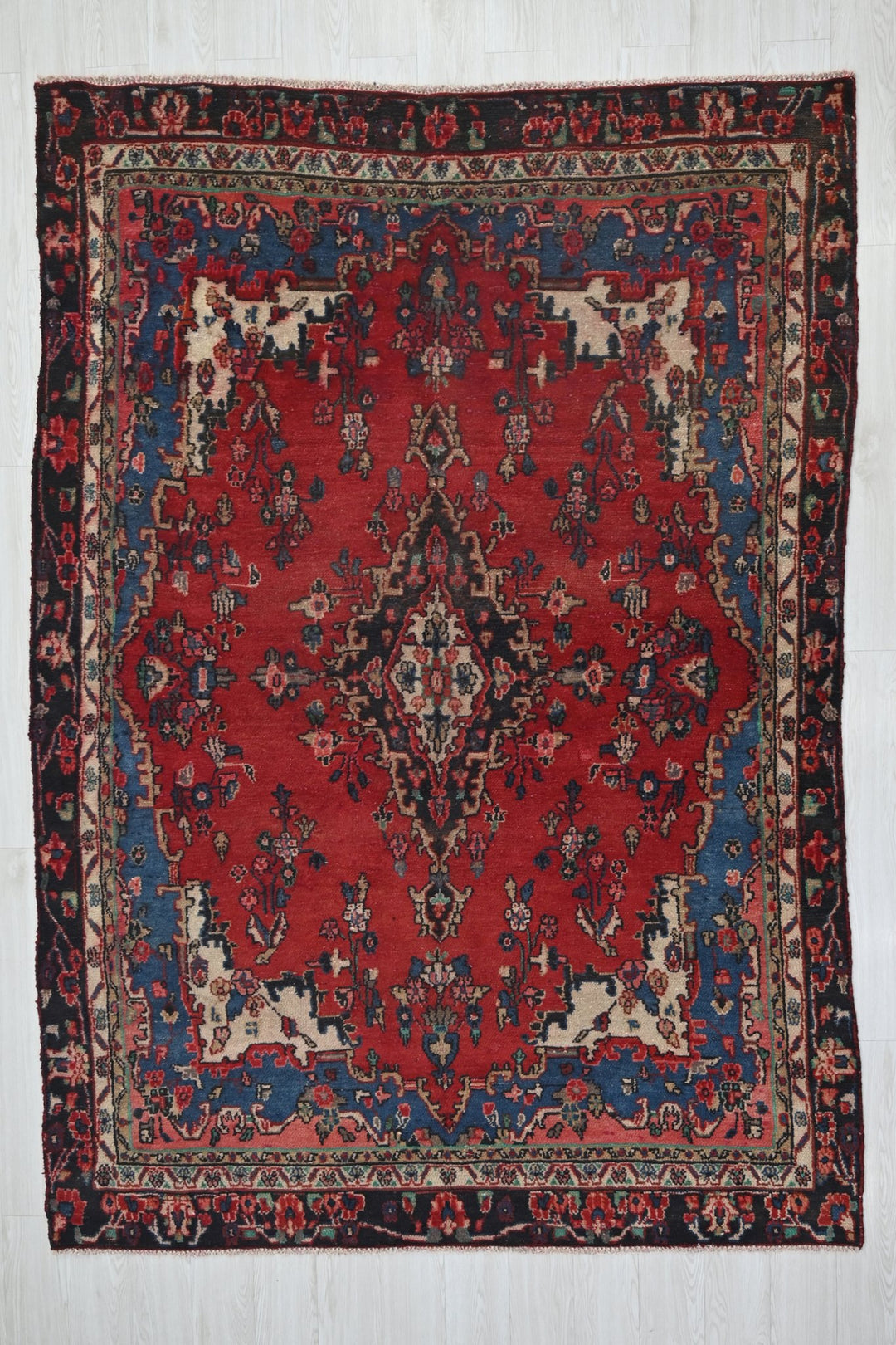 red Medium rug 6' 1" x 8' 11"