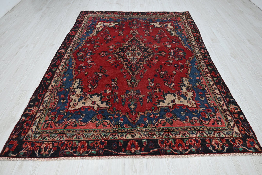 red Medium rug 6' 1" x 8' 11"
