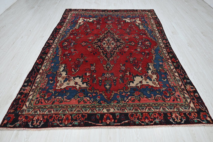 red Medium rug 6' 1" x 8' 11"