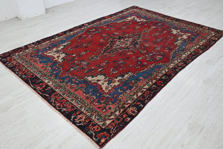 red Medium rug 6' 1" x 8' 11"
