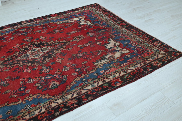 red Medium rug 6' 1" x 8' 11"