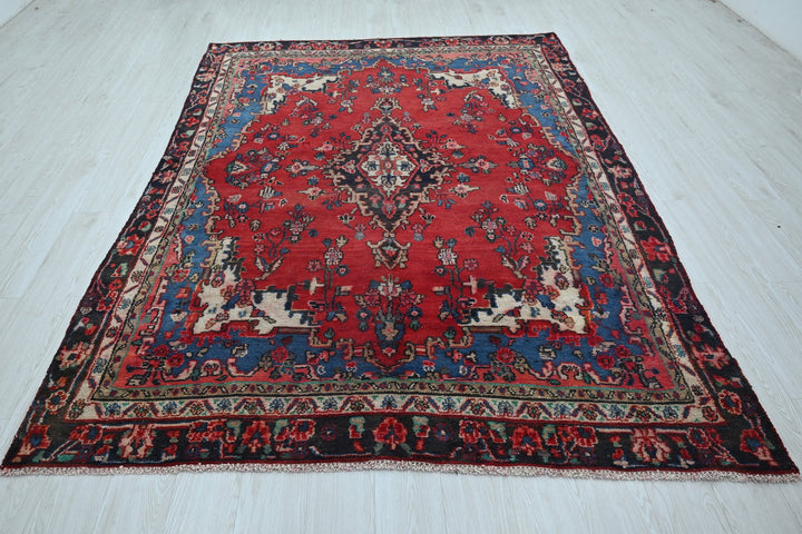 red Medium rug 6' 1" x 8' 11"