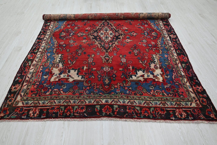 red Medium rug 6' 1" x 8' 11"