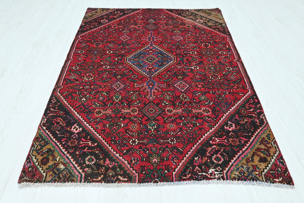 red Medium rug 4' 8" x 7' 3"