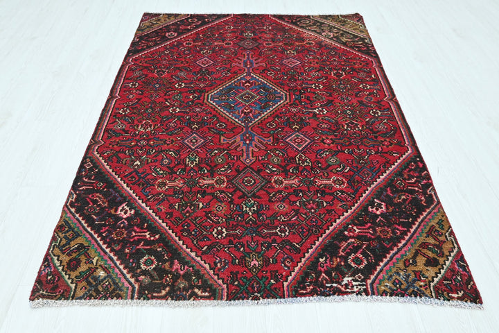 red Medium rug 4' 8" x 7' 3"