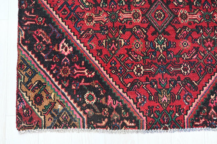 red Medium rug 4' 8" x 7' 3"