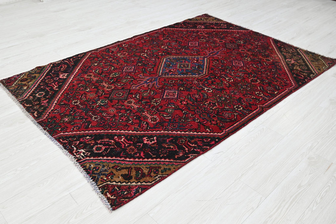 red Medium rug 4' 8" x 7' 3"
