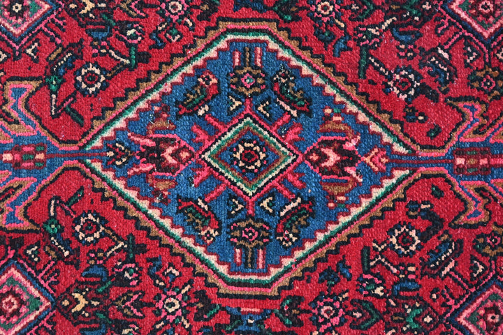 red Medium rug 4' 8" x 7' 3"