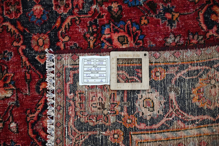 red Accent rug 4' 0" x 6' 0"