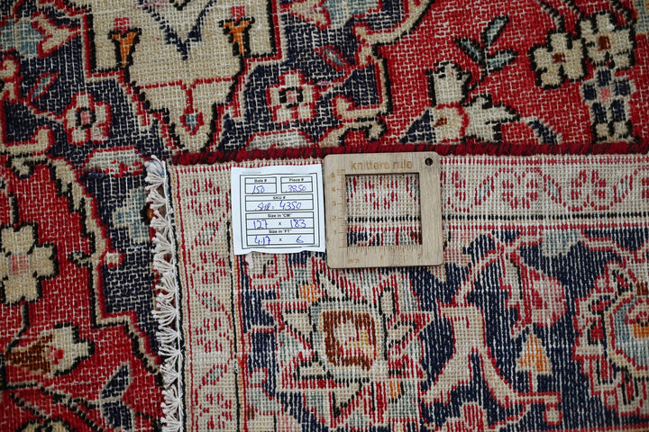 red Accent rug 4' 2" x 6' 0"
