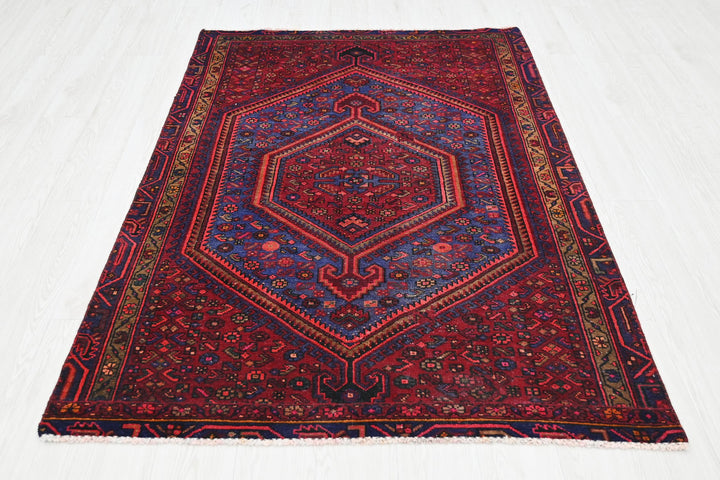 red Accent rug 4' 1" x 6' 4"