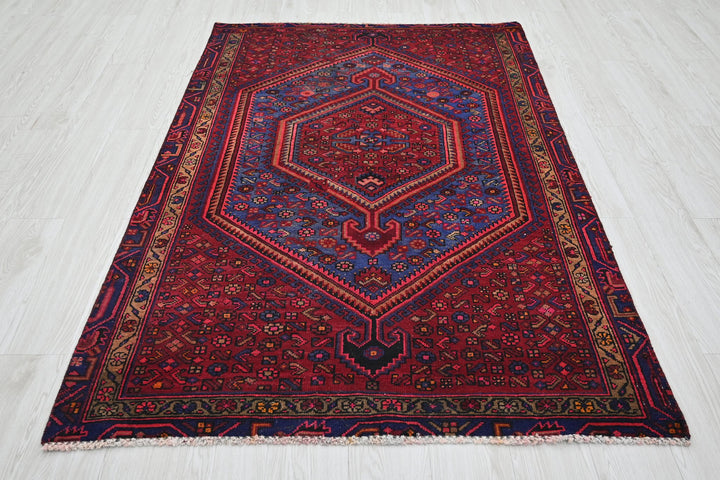 red Accent rug 4' 1" x 6' 4"