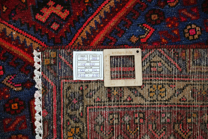 red Accent rug 4' 1" x 6' 4"