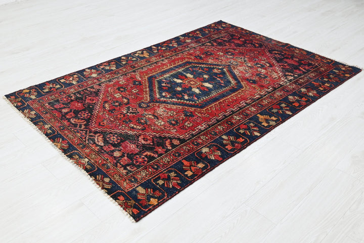 red Accent rug 3' 10" x 5' 11"