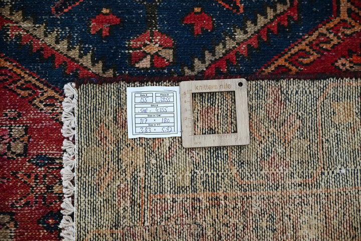 red Accent rug 3' 10" x 5' 11"