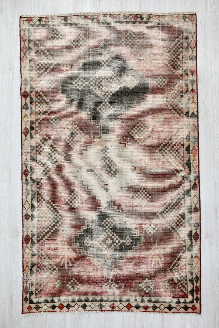 brown Medium rug 4' 10" x 7' 10"