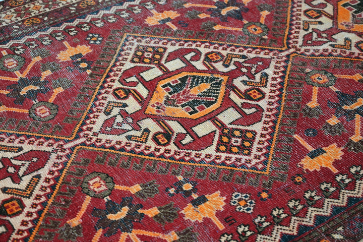 red Large rug 5' 0" x 9' 7"