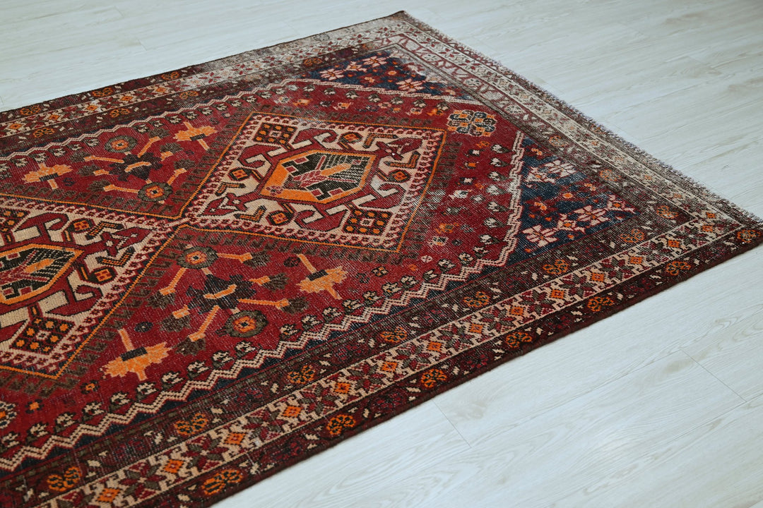red Large rug 5' 0" x 9' 7"