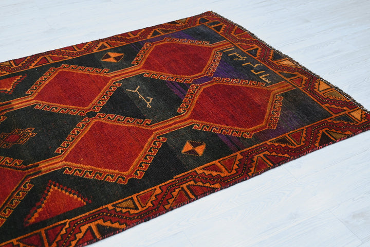 black Medium rug 4' 3" x 8' 1"