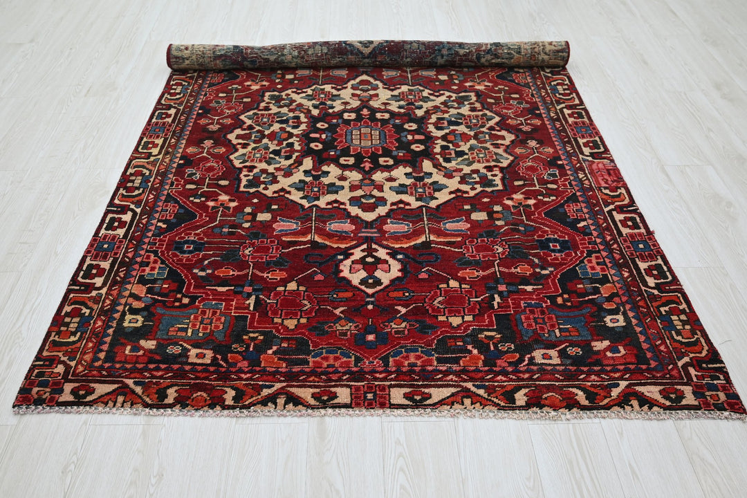 red Medium rug 5' 0" x 7' 1"