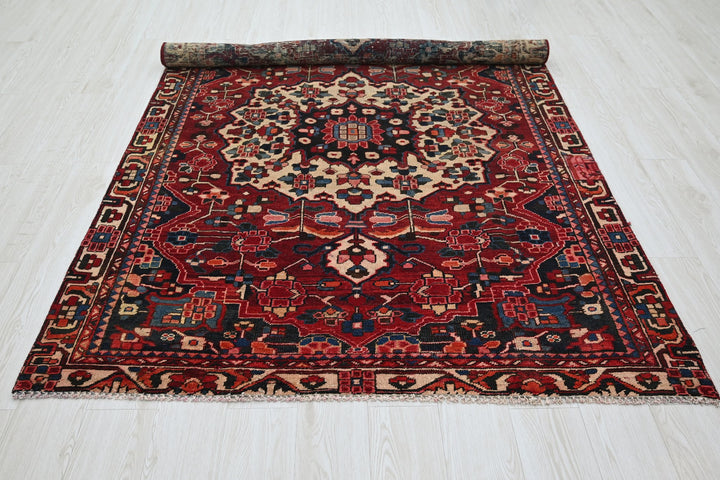 red Medium rug 5' 0" x 7' 1"