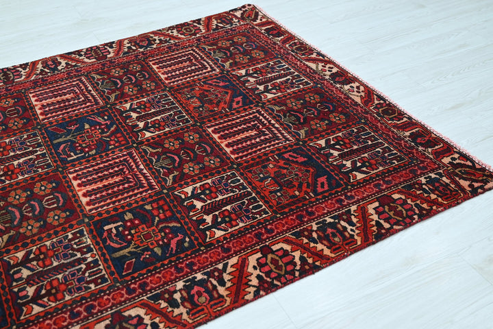 red Medium rug 4' 8" x 6' 4"