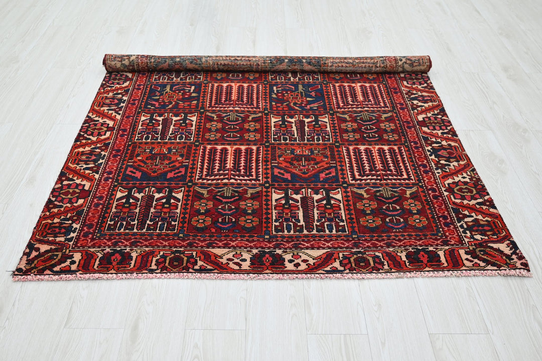 red Medium rug 4' 8" x 6' 4"
