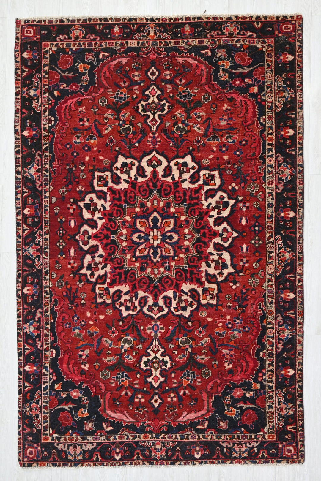 red Medium rug 5' 2" x 8' 6"