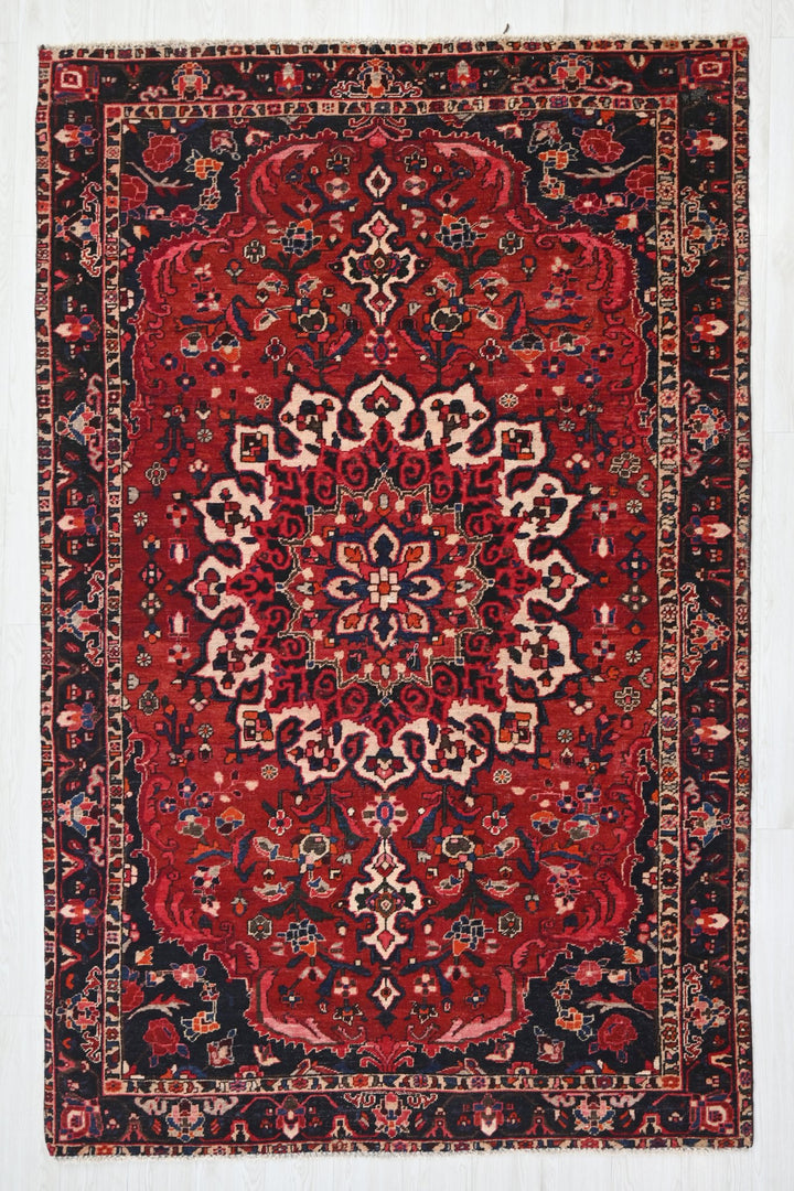 red Medium rug 5' 2" x 8' 6"