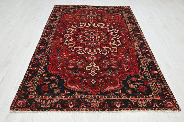 red Medium rug 5' 2" x 8' 6"