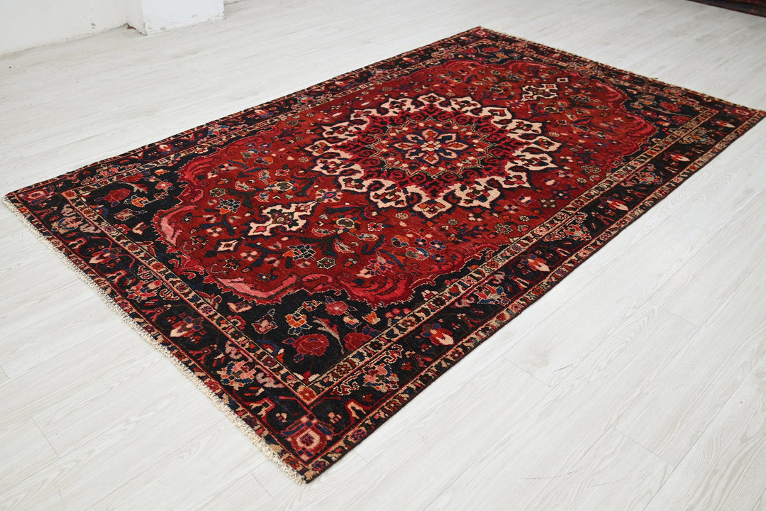 red Medium rug 5' 2" x 8' 6"
