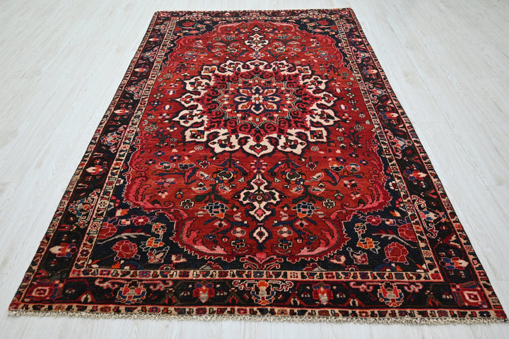 red Medium rug 5' 2" x 8' 6"