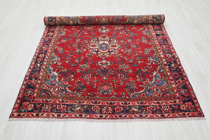 red Medium rug 4' 8" x 6' 4"