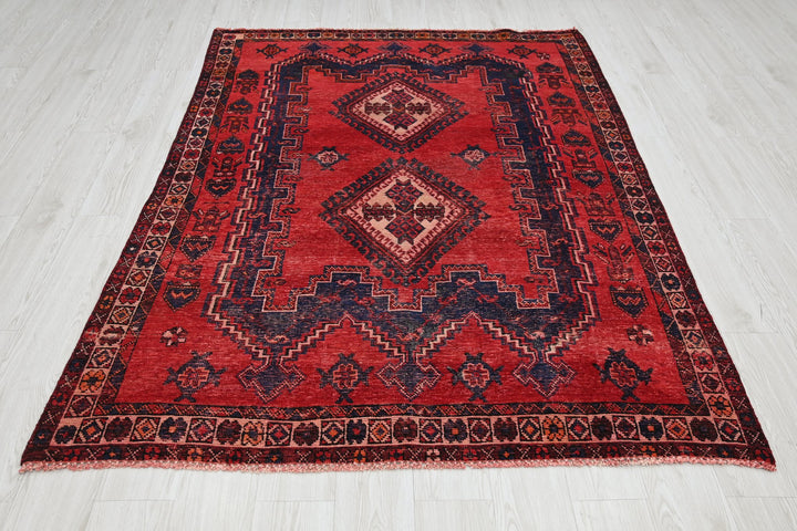red Medium rug 4' 11" x 6' 11"