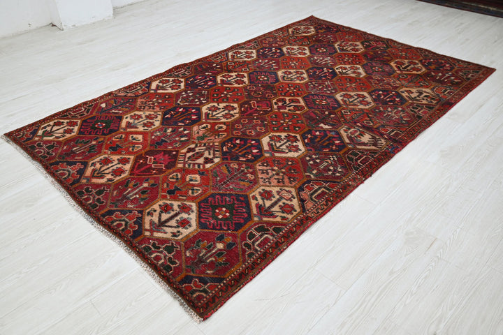 red Medium rug 5' 4" x 8' 10"