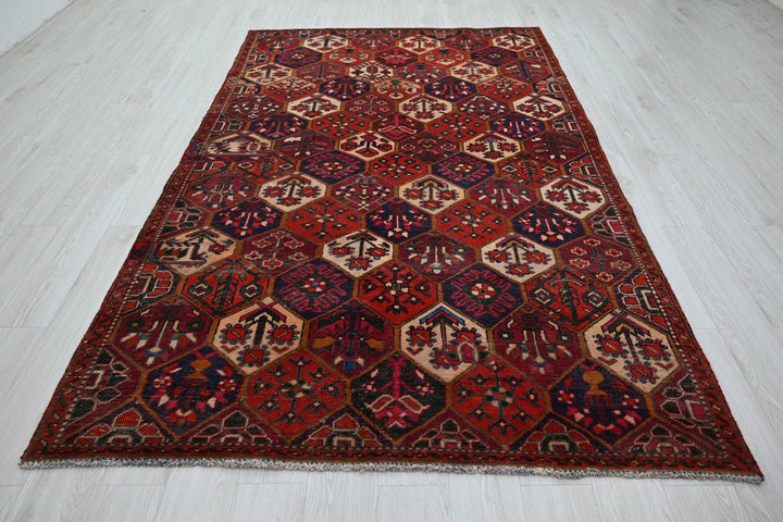 red Medium rug 5' 4" x 8' 10"