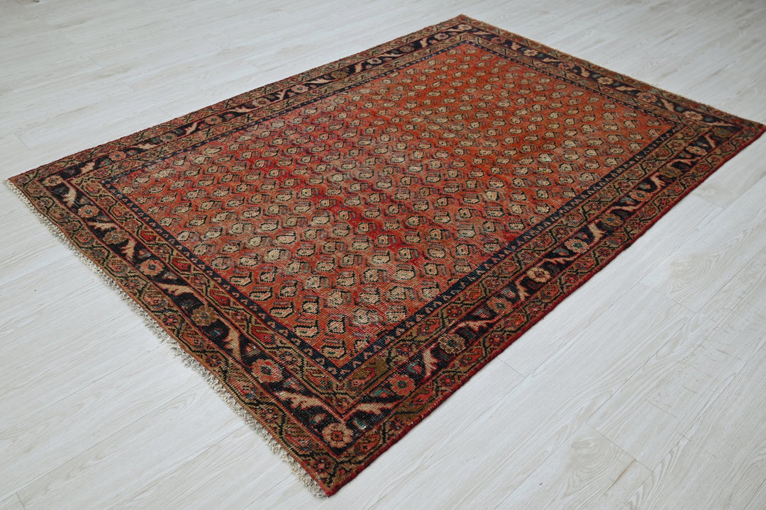 red Medium rug 4' 9" x 6' 7"