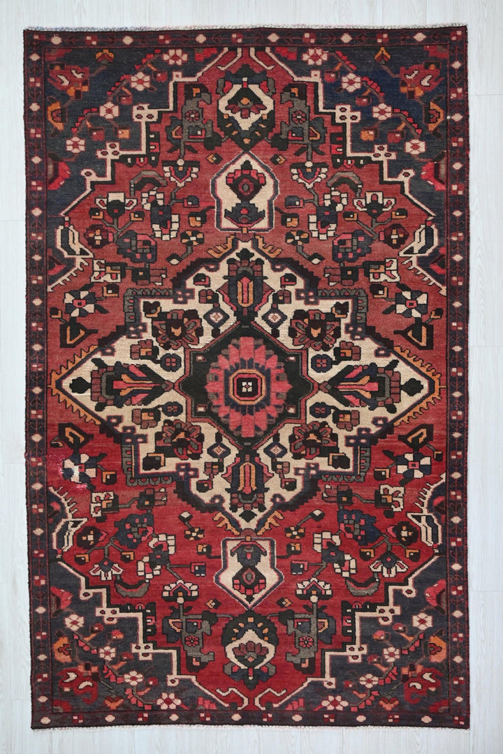 red Medium rug 5' 2" x 8' 6"