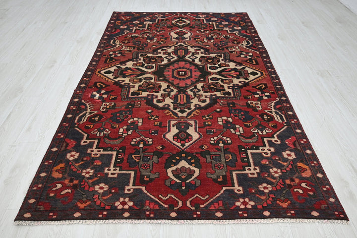 red Medium rug 5' 2" x 8' 6"