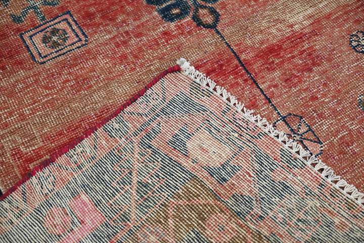 red Medium rug 4' 8" x 9' 2"