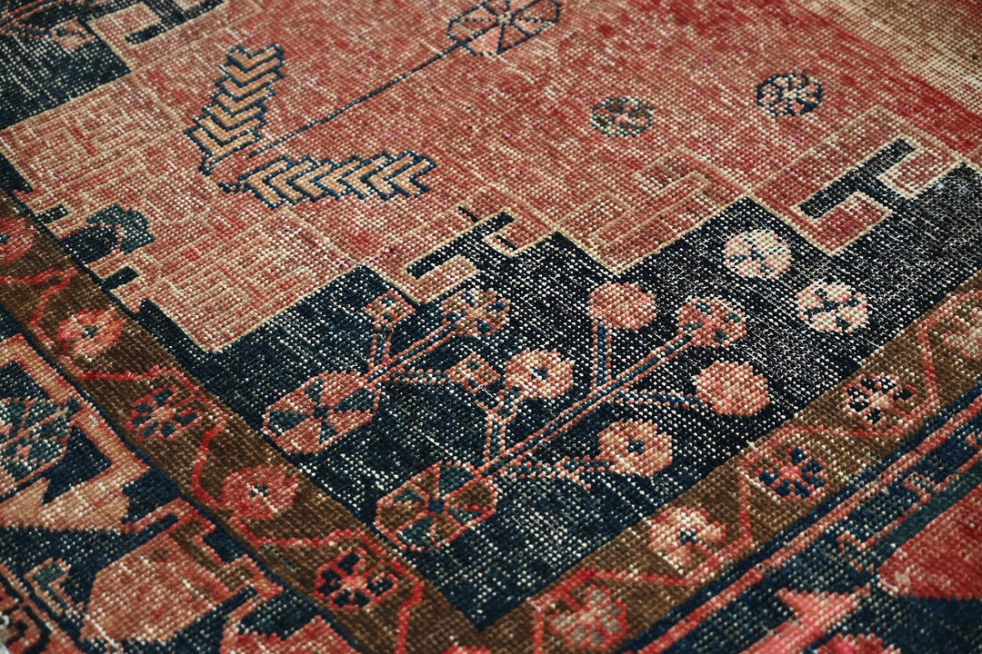 red Medium rug 4' 8" x 9' 2"