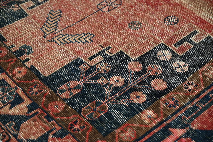 red Medium rug 4' 8" x 9' 2"