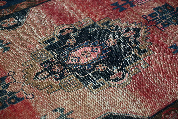 red Medium rug 4' 8" x 9' 2"