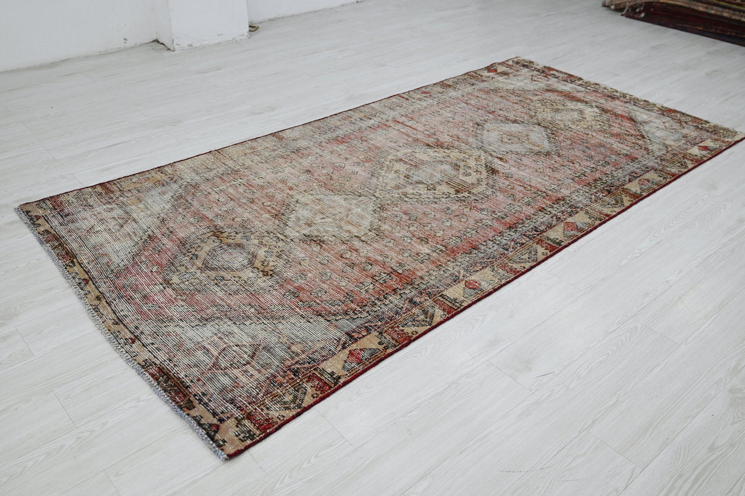 brown Medium rug 4' 5" x 9' 0"