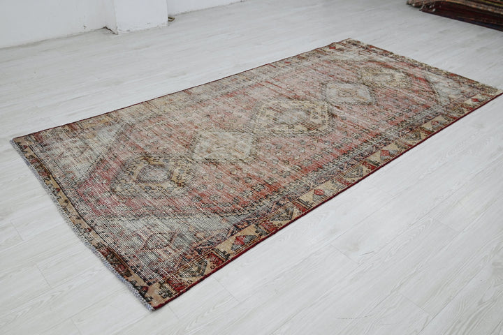 brown Medium rug 4' 5" x 9' 0"