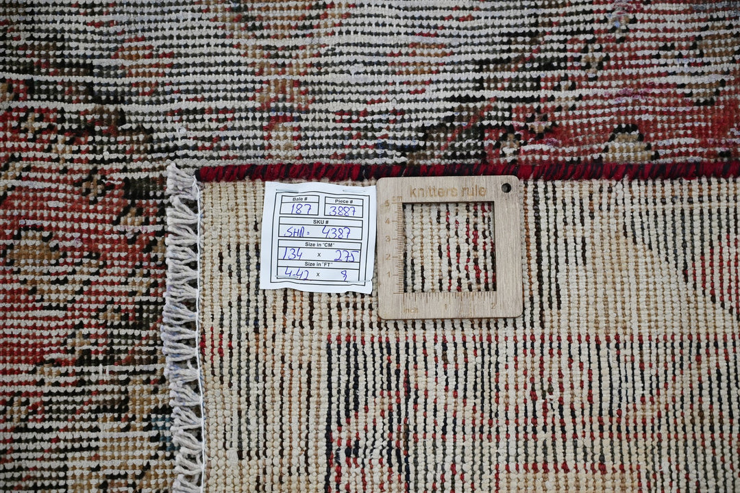 brown Medium rug 4' 5" x 9' 0"